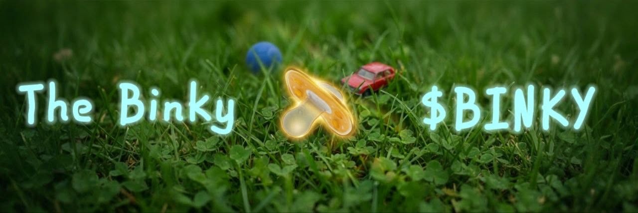 The Binky glowing in the grass — $BINKY
